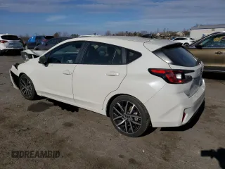 2024 Subaru Impreza Sport with VIN JF1GUAFCXR8299169, listed as a Copart auction lot 79579334 with 9,169 mi miles and Salvage Title. Bid and sale history available at carsss.com. Image 2.