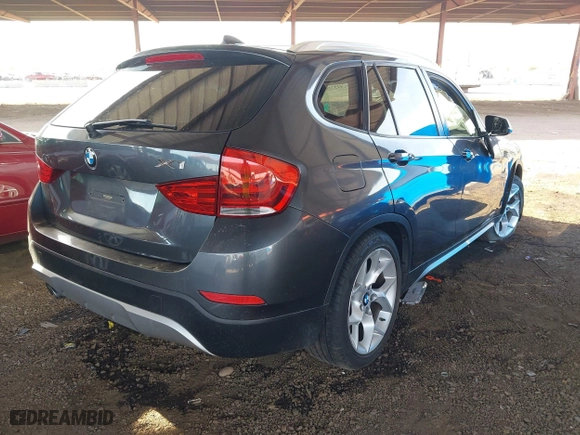 2013 BMW X1 28i with VIN WBAVM1C57DVW42096, listed as a IAAI auction lot 41572971 with 156,999 mi miles. Bid and sale history available at carsss.com. Image 4.