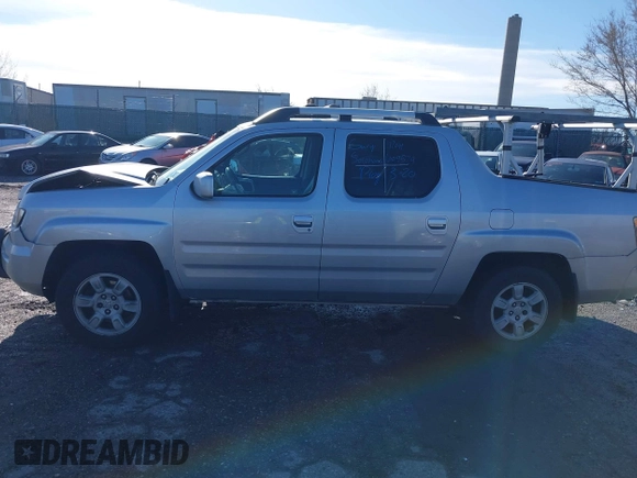 2006 Honda Ridgeline RTL z VIN 2HJYK165X6H570027, wystawiony jako IAAI lot #41868389 z przebiegiem 207 020 mil mil oraz . Historia ofert i sprzedaży dostępna na DreamBid. Obrazek 14.