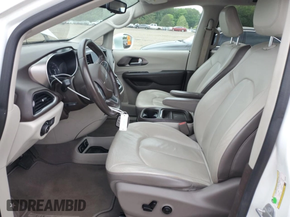 2017 Chrysler Pacifica Touring L with VIN 2C4RC1BG2HR734557, listed as a Copart auction lot 53630065 with 147,955 mi miles and Salvage Title. Bid and sale history available at DreamBid. Image 7.