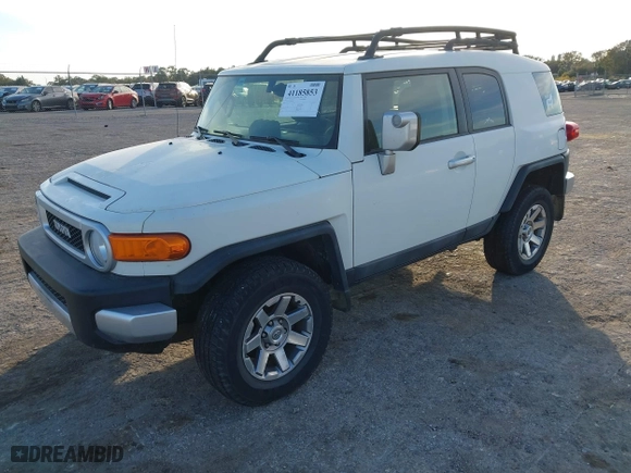 2014 Toyota FJ Cruiser with VIN JTEBU4BF1EK183485, listed as a IAAI auction lot 41185853 with 91,293 mi miles. Bid and sale history available at carsss.com. Image 2.