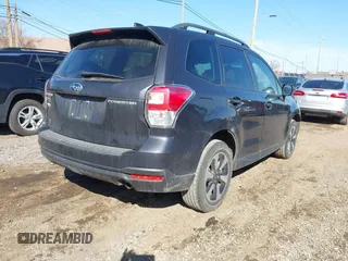 2018 Subaru Forester Premium with VIN JF2SJAEC9JH411903, listed as a IAAI auction lot 41844000 with 91,090 mi miles and . Bid and sale history available at DreamBid. Image 4.