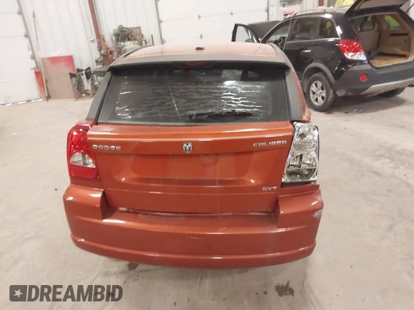 2009 Dodge Caliber SXT with VIN 1B3HB48A59D168273, listed as a IAAI auction lot 41988835 with 200,125 mi miles and . Bid and sale history available at DreamBid. Image 16.