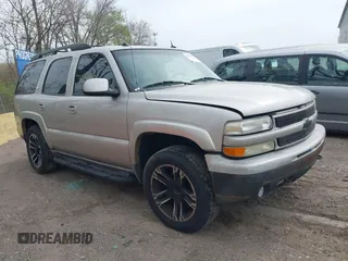2005 Chevrolet Tahoe LT z VIN 1GNEK13TX5R187169, wystawiony jako IAAI lot #42023124 z przebiegiem 253 648 mil mil oraz . Historia ofert i sprzedaży dostępna na DreamBid. Obrazek 1.