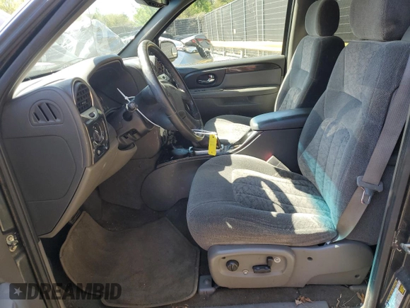 2004 GMC Envoy SLT with VIN 1GKET16S046155005, listed as a Copart auction lot 53554505 with 184,039 mi miles and Salvage Title. Bid and sale history available at DreamBid. Image 7.