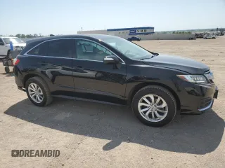 2016 Acura RDX Technology with VIN 5J8TB4H56GL012825, listed as a Copart auction lot 61005445 with 129,242 mi miles and Salvage title. Bid and sale history available at DreamBid. Image 4.