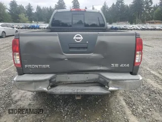 2006 Nissan Frontier SE with VIN 1N6AD06W76C415051, listed as a Copart auction lot 57486555 with 162,012 mi miles and Salvage title. Bid and sale history available at DreamBid. Image 6.