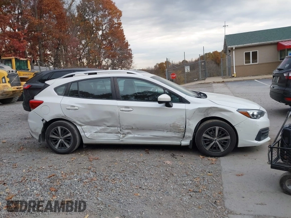 2020 Subaru Impreza Premium z VIN 4S3GTAV65L3706134, wystawiony jako IAAI lot #40711288 z przebiegiem 56 288 mil mil oraz . Historia ofert i sprzedaży dostępna na DreamBid. Obrazek 14.
