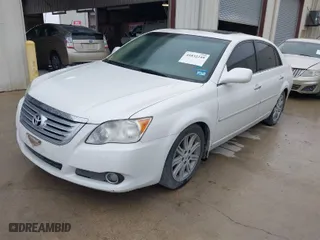 2010 Toyota Avalon XL with VIN 4T1BK3DB3AU356836, listed as a IAAI auction lot 41832249 with 208,547 mi miles. Bid and sale history available at carsss.com. Image 2.
