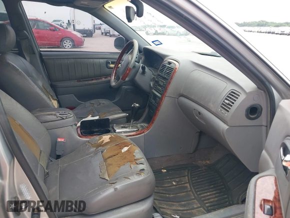2003 Kia Optima LX z VIN KNAGD128235248556, wystawiony jako IAAI lot #42366002 z przebiegiem 140 904 mil mil oraz . Historia ofert i sprzedaży dostępna na DreamBid. Obrazek 5.