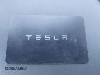 2023 Tesla Model Y Long Range with VIN 7SAYGDEEXPA129790, listed as a IAAI auction lot 41735721 with 20,402 mi miles and . Bid and sale history available at DreamBid. Image 11.