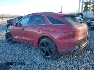 2022 Genesis GV70 Sport with VIN KMUMCDTC6NU022071, listed as a Copart auction lot 88874765 with 57,204 mi miles and Salvage title. Bid and sale history available at DreamBid. Image 2.