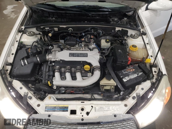 2004 Saturn L L300 2 z VIN 1G8JD54R94Y513778, wystawiony jako Copart lot #48287505 z przebiegiem 102 017 mil mil oraz Nie do naprawy • Non repairable. Historia ofert i sprzedaży dostępna na DreamBid. Obrazek 11.