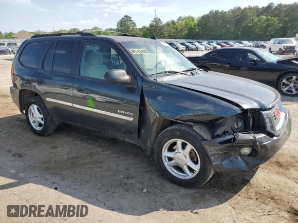 2006 GMC Envoy SLE with VIN 1GKDS13S362258903, listed as a Copart auction lot 53209035 with 255,693 mi miles and Salvage Title. Bid and sale history available at carsss.com. Image 4.