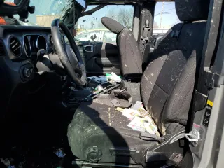 2023 Jeep Wrangler Sport S with VIN 1C4GJXANXPW609778, listed as a Copart auction lot 48559505 with Not provided miles and Salvage title. Bid and sale history available at DreamBid. Image 7.