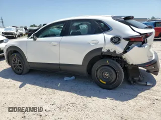 2023 Mazda CX-30 S with VIN 3MVDMBAM3PM575394, listed as a Copart auction lot 52531455 with 51,155 mi miles and Salvage title. Bid and sale history available at DreamBid. Image 2.