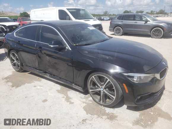 2019 BMW 4 Series 430i with VIN WBA4J1C59KBM18704, listed as a Copart auction lot 61022375 with 77,778 mi miles and Clean title. Bid and sale history available at DreamBid. Image 4.