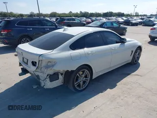 2016 BMW 4 Series 435i xDrive with VIN WBA4B3C58GG528016, listed as a IAAI auction lot 41506077 with 87,975 mi miles and . Bid and sale history available at DreamBid. Image 4.