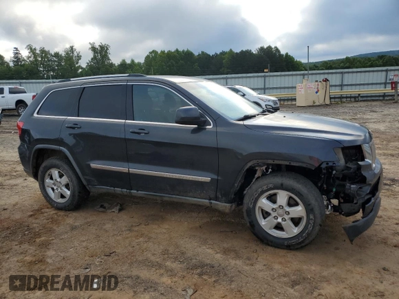 2011 Jeep Grand Cherokee Laredo z VIN 1J4RR4GG0BC518726, wystawiony jako Copart lot #58985765 z przebiegiem 163 625 mil mil oraz Szkoda całkowita • Salvage title. Historia ofert i sprzedaży dostępna na DreamBid. Obrazek 4.