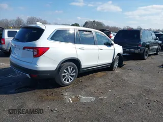 2021 Honda Pilot EX-L with VIN 5FNYF5H57MB037861, listed as a IAAI auction lot 41566924 with 42,867 mi miles. Bid and sale history available at carsss.com. Image 4.