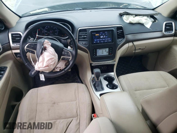 2016 Jeep Grand Cherokee Laredo with VIN 1C4RJEAG4GC394091, listed as a Copart auction lot 56595165 with 134,135 mi miles and Salvage title. Bid and sale history available at DreamBid. Image 8.