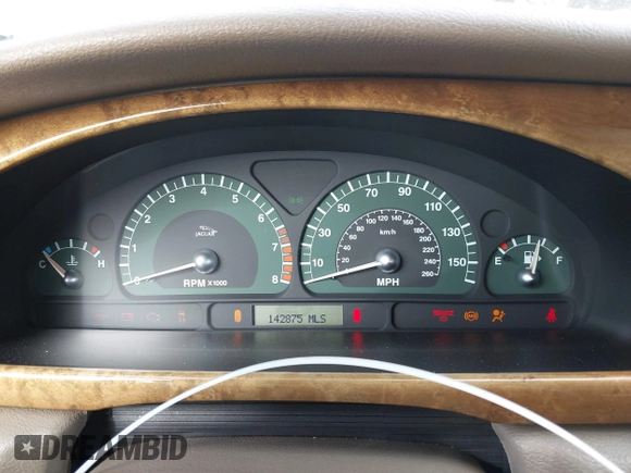 2003 Jaguar S-Type with VIN SAJEA01T83FM48713, listed as a IAAI auction lot 41402152 with 142,875 mi miles and . Bid and sale history available at DreamBid. Image 7.