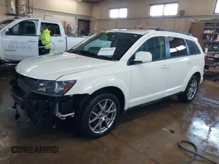 2015 Dodge Journey R/T with VIN 3C4PDDEGXFT574696, listed as a IAAI auction lot 41542460 with 153,044 mi miles and . Bid and sale history available at DreamBid. Image 2.