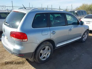 2007 Volkswagen Touareg V6 with VIN WVGZE77L97D026113, listed as a IAAI auction lot 41577000 with 144,118 mi miles and . Bid and sale history available at DreamBid. Image 4.