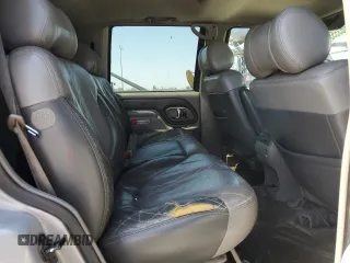 1999 GMC Denali z VIN 1GKEK13R6XR914411, wystawiony jako Copart lot #56063555 z przebiegiem 231 344 mil mil oraz Szkoda całkowita • Salvage title. Historia ofert i sprzedaży dostępna na DreamBid. Obrazek 11.