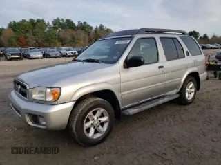 2003 Nissan Pathfinder LE z VIN JN8DR09Y03W823467, wystawiony jako Copart lot #78801234 z przebiegiem 142 990 mil mil oraz Czysty tytuł • Clean title. Historia ofert i sprzedaży dostępna na DreamBid. Obrazek 1.