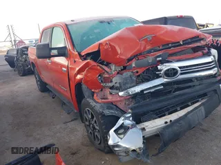 2016 Toyota Tundra 4WD Truck SR5 with VIN 5TFDW5F11GX571334, listed as a IAAI auction lot 41228746 with 95,457 mi miles. Bid and sale history available at carsss.com. Image 1.
