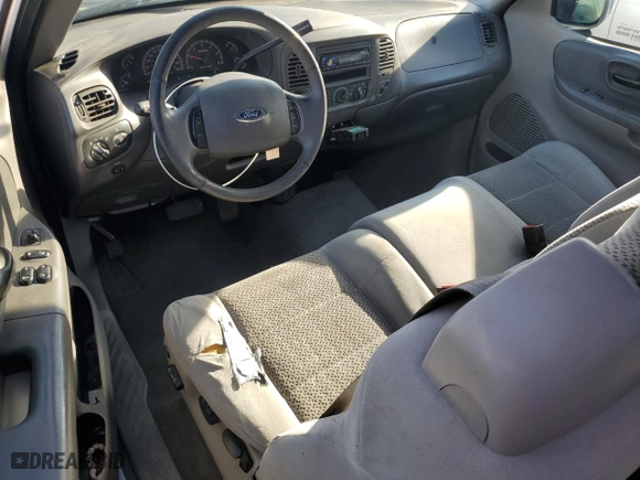 2003 Ford F-150 Work Series with VIN 2FTRX17WX3CA63767, listed as a Copart auction lot 84299684 with 165,719 mi miles and Salvage Title. Bid and sale history available at carsss.com. Image 8.