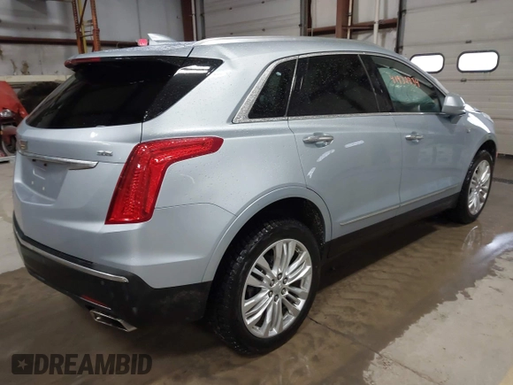 2017 Cadillac XT5 Premium Luxury AWD z VIN 1GYKNERS4HZ306955, wystawiony jako IAAI lot #41932934 z przebiegiem 150 050 mil mil oraz . Historia ofert i sprzedaży dostępna na DreamBid. Obrazek 4.