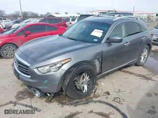 2014 Infiniti QX70 with VIN JN8CS1MW2EM412582, listed as a IAAI auction lot 41449958 with 100,115 mi miles. Bid and sale history available at carsss.com. Image 17.