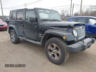 2018 Jeep Wrangler JK Unlimited Altitude with VIN 1C4BJWEG1JL843963, listed as a IAAI auction lot 41287894 with 120,701 mi miles. Bid and sale history available at carsss.com. Image 1.