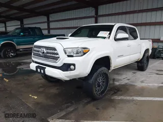 2016 Toyota Tacoma SR with VIN 5TFCZ5AN3GX039919, listed as a IAAI auction lot 41607382 with 107,703 mi miles. Bid and sale history available at carsss.com. Image 17.