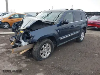2009 Jeep Grand Cherokee Limited with VIN 1J8HR58P89C542314, listed as a IAAI auction lot 41880894 with 103,032 mi miles. Bid and sale history available at carsss.com. Image 2.