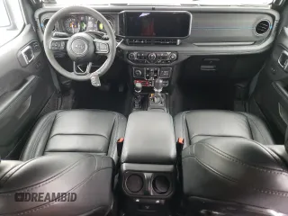 2024 Jeep Wrangler Rubicon with VIN 1C4RJXR66RW237347, listed as a Copart auction lot 88774995 with 18,018 mi miles and Salvage Title. Bid and sale history available at DreamBid. Image 8.