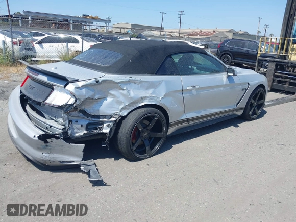 2018 Ford Mustang GT Premium z VIN 1FATP8FF3J5155512, wystawiony jako IAAI lot #42136242 z przebiegiem 94 230 mil mil oraz . Historia ofert i sprzedaży dostępna na DreamBid. Obrazek 4.