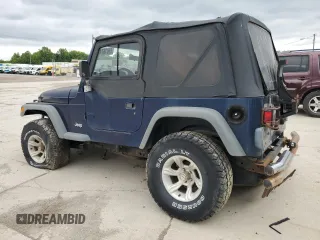 2000 Jeep Wrangler Sport z VIN 1J4FA49S1YP713523, wystawiony jako Copart lot #58076745 z przebiegiem 117 112 mil mil oraz Czysty tytuł • Clean title. Historia ofert i sprzedaży dostępna na DreamBid. Obrazek 2.