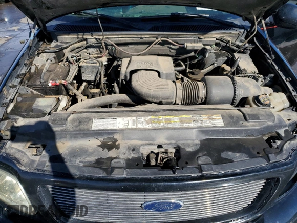 2000 Ford F-150 XL with VIN 2FTRX07L0YCB10621, listed as a Copart auction lot 42147705 with Not provided miles and Salvage title. Bid and sale history available at DreamBid. Image 11.