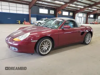 1999 Porsche Boxster z VIN WP0CA298XXU626611, wystawiony jako Copart lot #50950385 z przebiegiem 101 051 mil mil oraz Czysty tytuł • Clean title. Historia ofert i sprzedaży dostępna na DreamBid. Obrazek 1.