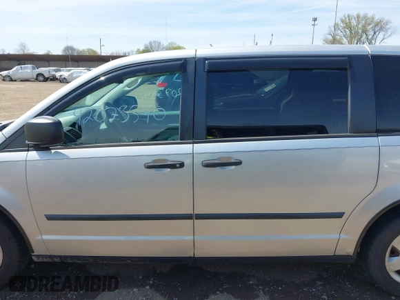 2008 Dodge Grand Caravan SE with VIN 2D8HN44H58R797943, listed as a IAAI auction lot 42073540 with 161,596 mi miles and . Bid and sale history available at DreamBid. Image 14.