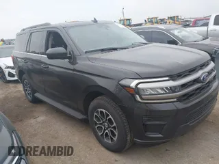 2024 Ford Expedition XLT with VIN 1FMJU1J81REA43051, listed as a IAAI auction lot 41932149 with 26,715 mi miles. Bid and sale history available at carsss.com. Image 1.