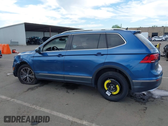 2019 Volkswagen Tiguan SE with VIN 3VV3B7AX2KM064568, listed as a IAAI auction lot 42008754 with 53,132 mi miles and . Bid and sale history available at DreamBid. Image 14.