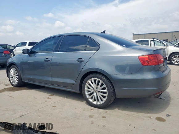 2014 Volkswagen Jetta TDI w/Premium/Nav with VIN 3VWLL7AJ7EM385112, listed as a Copart auction lot 58063295 with 169,683 mi miles and Salvage title. Bid and sale history available at DreamBid. Image 2.