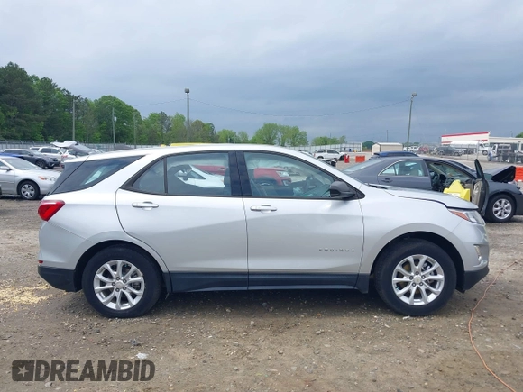 2018 Chevrolet Equinox LS with VIN 2GNAXHEV4J6196902, listed as a IAAI auction lot 42098323 with 22,942 mi miles and . Bid and sale history available at DreamBid. Image 13.