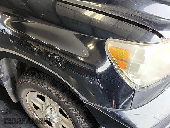 2013 Toyota Tundra z VIN 5TFCY5F16DX014789, wystawiony jako IAAI lot #42598891 z przebiegiem 246 599 mil mil oraz . Historia ofert i sprzedaży dostępna na DreamBid. Obrazek 1.