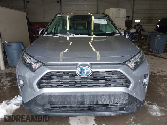 2024 Toyota RAV4 Hybrid XLE Premium with VIN JTMB6RFV5RD148973, listed as a IAAI auction lot 41516422 with 8,797 mi miles. Bid and sale history available at carsss.com. Image 12.