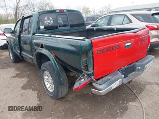 2001 Dodge Dakota Sport z VIN 1B7HG2ANX1S256902, wystawiony jako IAAI lot #42037703 z przebiegiem 121 914 mil mil oraz . Historia ofert i sprzedaży dostępna na DreamBid. Obrazek 6.